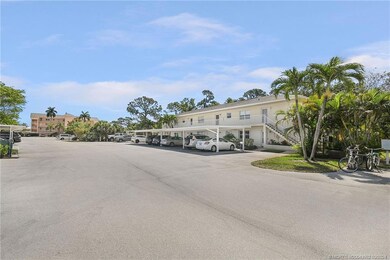 Condo Exterior and Covered Parking Area