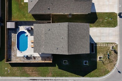 Drone / aerial view of a pool area