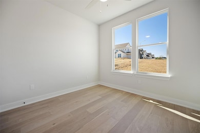 Unfurnished room featuring light wood-style floor