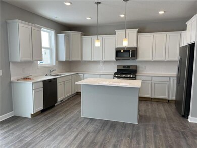 What a great kitchen to entertain in, everyone wil