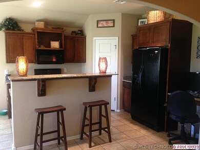 Kitchen with bar and office nook
