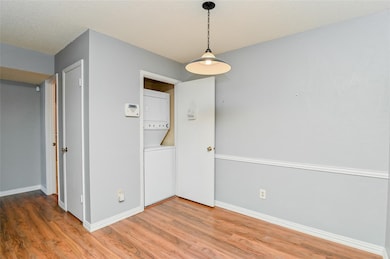 Living Room towards Dining / Laundry