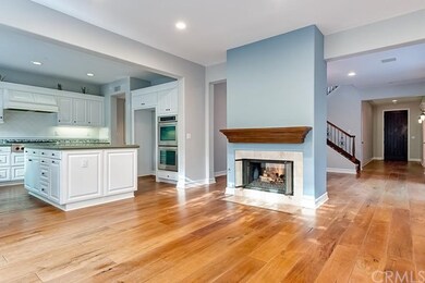 Open floor plan featuring a crystal lit/dual-sided