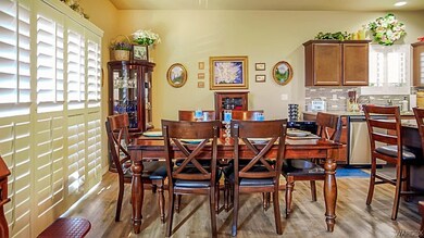 Open dining room featuring light hardwood / wood-s