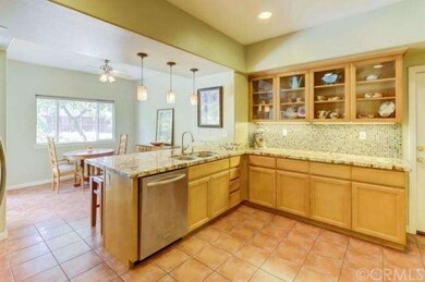 Another view of kitchen  showing  breakfast nook a