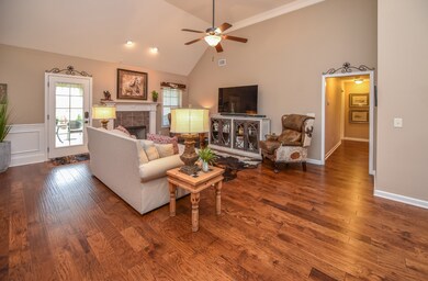 Fireplace in cozy living area door leads to the outside living area