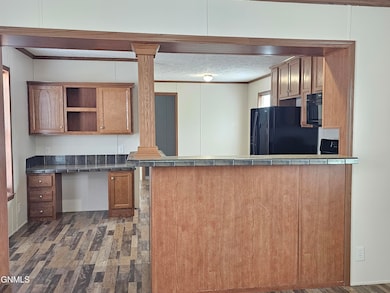 1023 28th St W, Williston, ND 58801 - photo 5