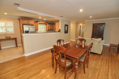 The kitchen opens to the dining room/living room a