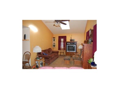 Family room with vaulted ceiling and great natural