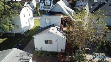 2nd story Deck and Paver Patio on the ground