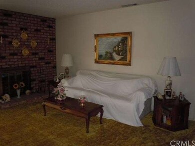 Living room and brick fireplace