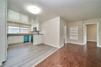 Remodeled Kitchen and open space to living room