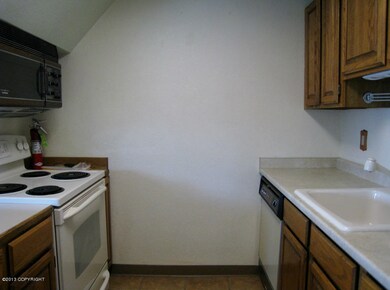 Kitchen With Electric Range