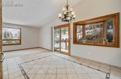 Dining area/Kitchen with a bay window and walk out