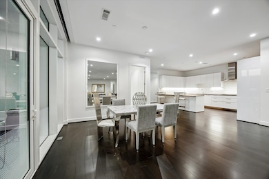 Located between the kitchen and one of two balconies, is the dinning room that could accommodate a table of 12-14 people possibly more. Enjoy your dinner while watching the some of the most spectacular Texas sunsets.