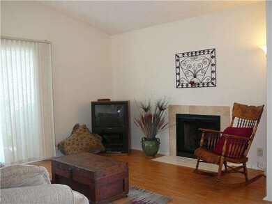 Open living space between living room, dining room