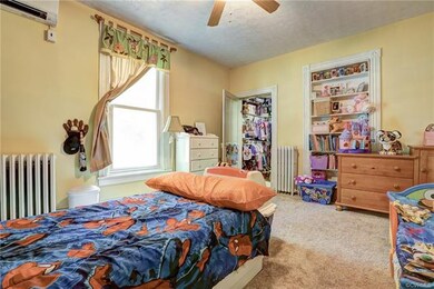 Bedroom 2 with Carpet, Walk-in closet & Built-in C