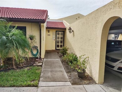 Front and Entrance to Carport