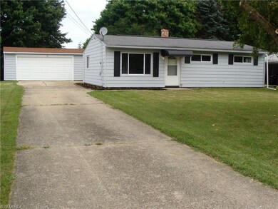 Front of home and 2 car garage