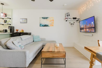 Living area featuring light wood-style flooring a