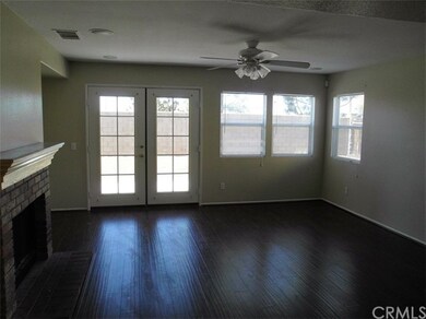view from kitchen to family room, looking into bac