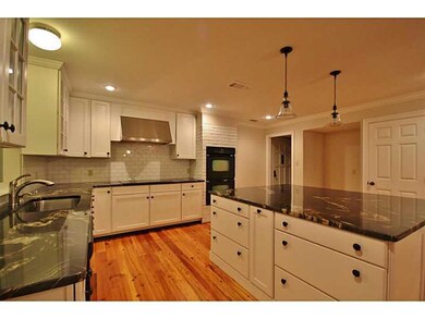 Photo. Completely remodeled kitchen with large isl