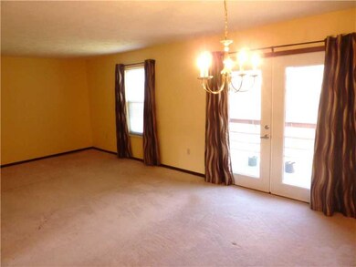 Living Room. Warm neutral tones surround this spac