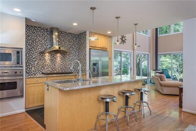 True chef's kitchen with double sink, double oven,