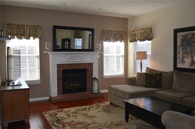 Family Room/ Gas fireplace, recessed lighting, bea