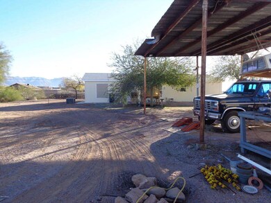 Carport to rear of home