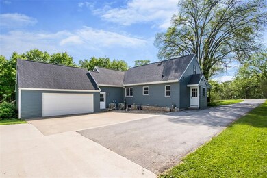 Backview of home with attached two car garage