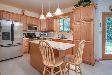 Maple wood cabinets and solid surface counter tops