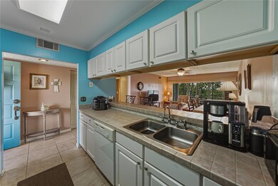 View from Kitchen looking into entry and living room