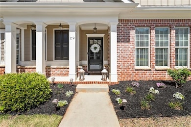 Welcoming entry with covered porch