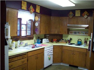 Kitchen has built in cooktop and wall oven.