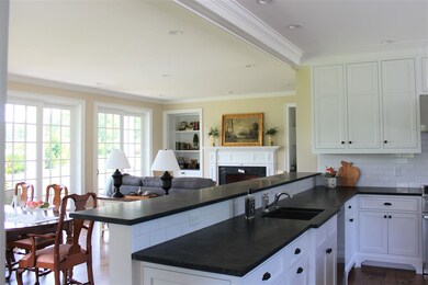 Custom cabinetry, stainless appliances, awesome views (while doing the dishes!)