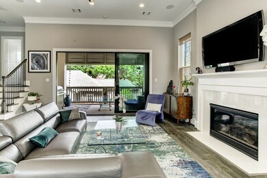 Opening the large sliding glass doors allows for c