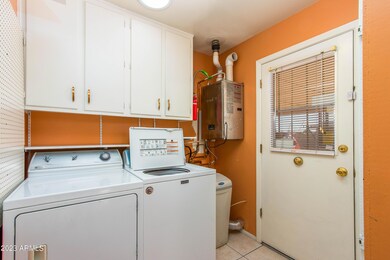 Laundry Room w/Tankless Water Heater