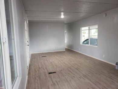living room looking towards carport