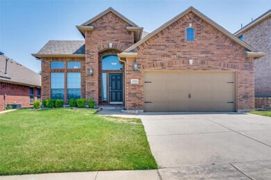 View of front property featuring a  2 car garage