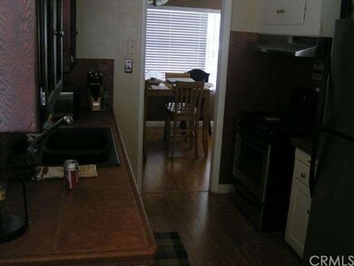Shot from south end of kitchen showing new cabinet