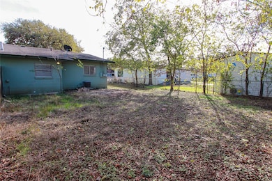 View of fenced backyard