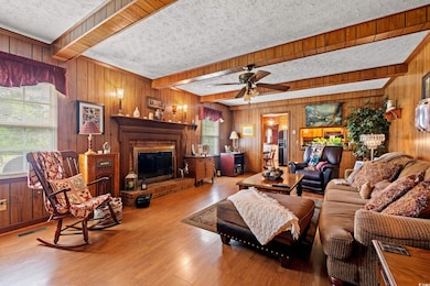 Living area featuring visible vents, wood finished