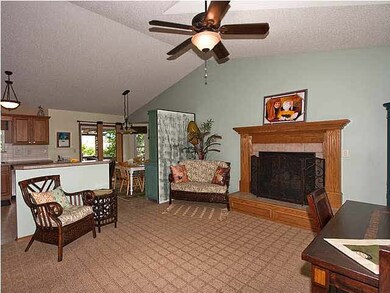 Floor plan opens to the kitchen and dining room.