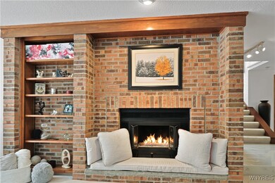 Brick fireplace w/fireglass