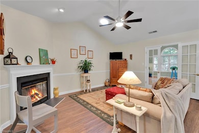Living room w/ Skylight