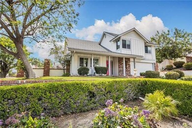 View of nicely landscaped corner lot.