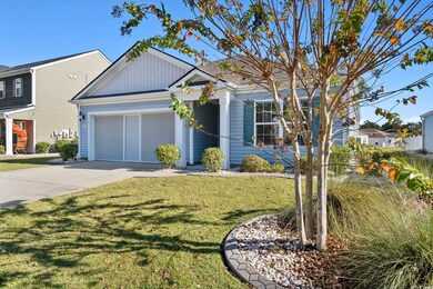 View of front of property featuring a front lawn a