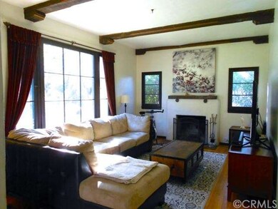 Large, bright living room with beautiful windows a