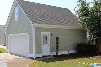 2 CAR DETACHED GARAGE WITH WALK UP STEPS TO 2 LEVE
